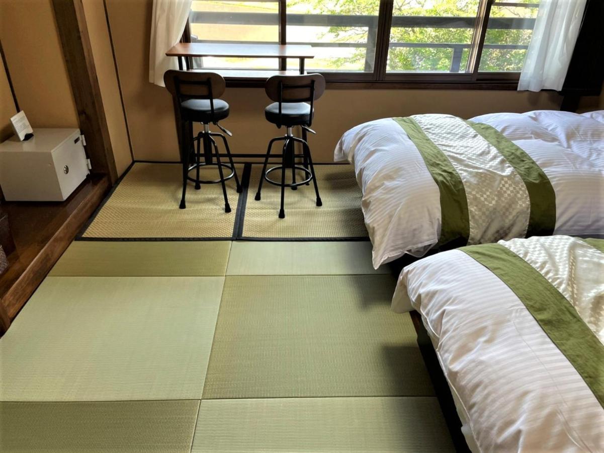 Sanso Tanaka Hotel Yufu Bagian luar foto