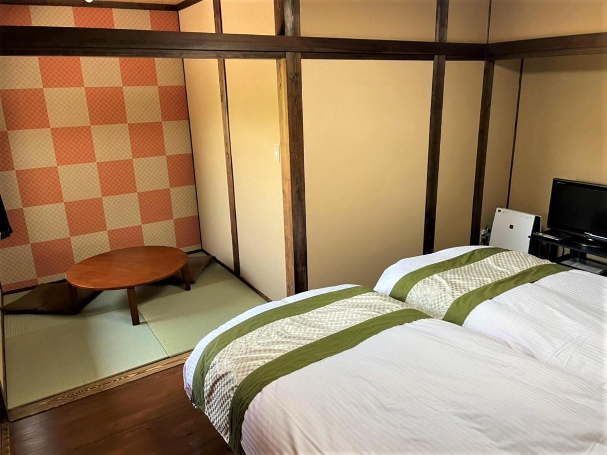 Sanso Tanaka Hotel Yufu Bagian luar foto