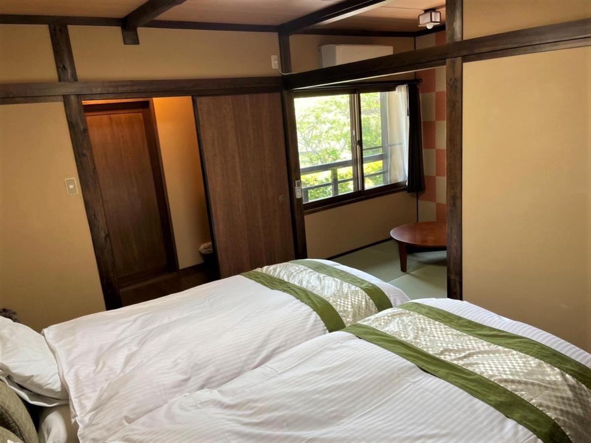 Sanso Tanaka Hotel Yufu Bagian luar foto